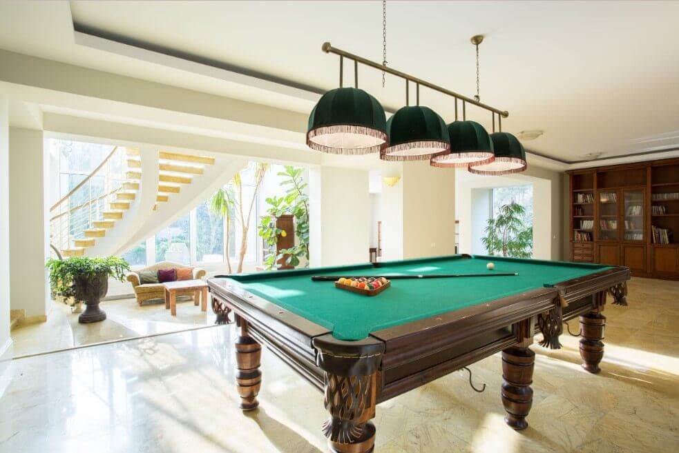 Green Pool table on a living room