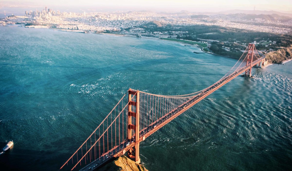 the golden gate bridge stretches across the bay