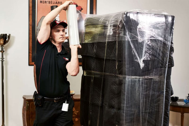 FlatRate Movers - Your Furniture Is Professionally Wrapped For Protection