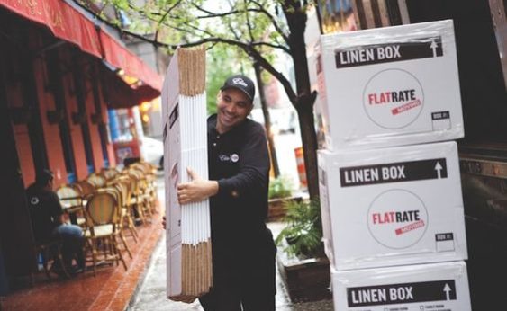 Flat Rate Box FlatRate mover carrying boxes providing a hand-offs storage moving service.