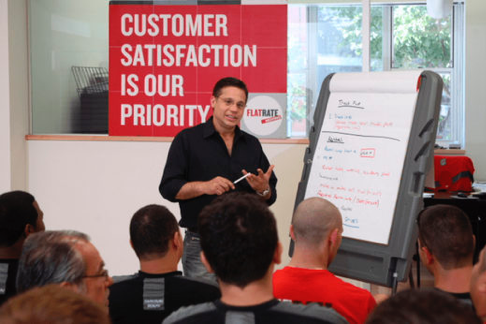 A teacher at the FlatRate moving school