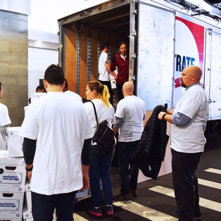 FlatRate movers helping at a community event