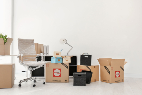 An office filled with FlatRate boxes