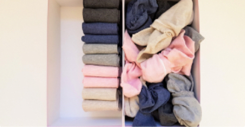 A cleanly packed box next to a messy box