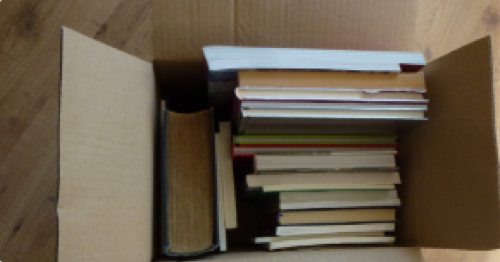 Books stacked in a box
