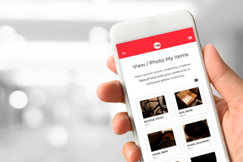 A phone displays the FlatRate app