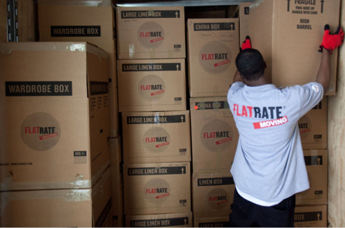 A FlatRate mover stacks boxes