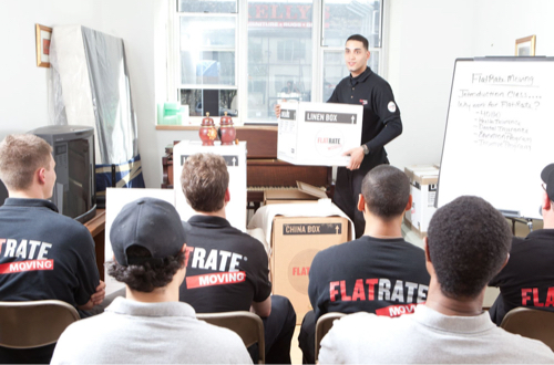 A FlatRate movers trains a class of new movers