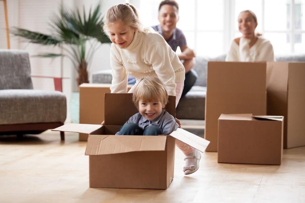 Kids playing with boxes