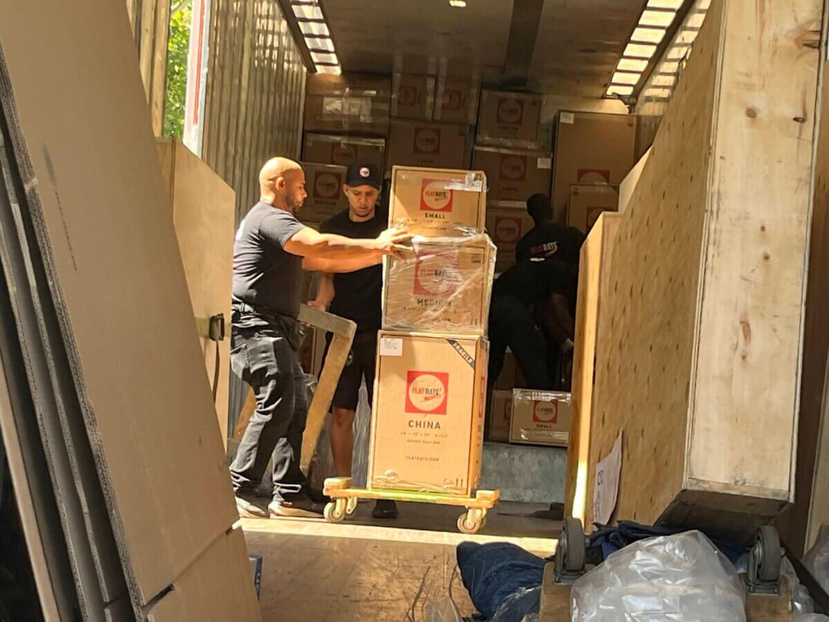 image of people moving boxes