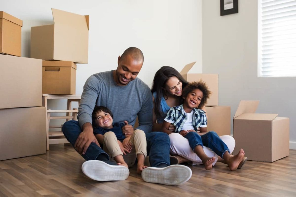 Family at home with boxes