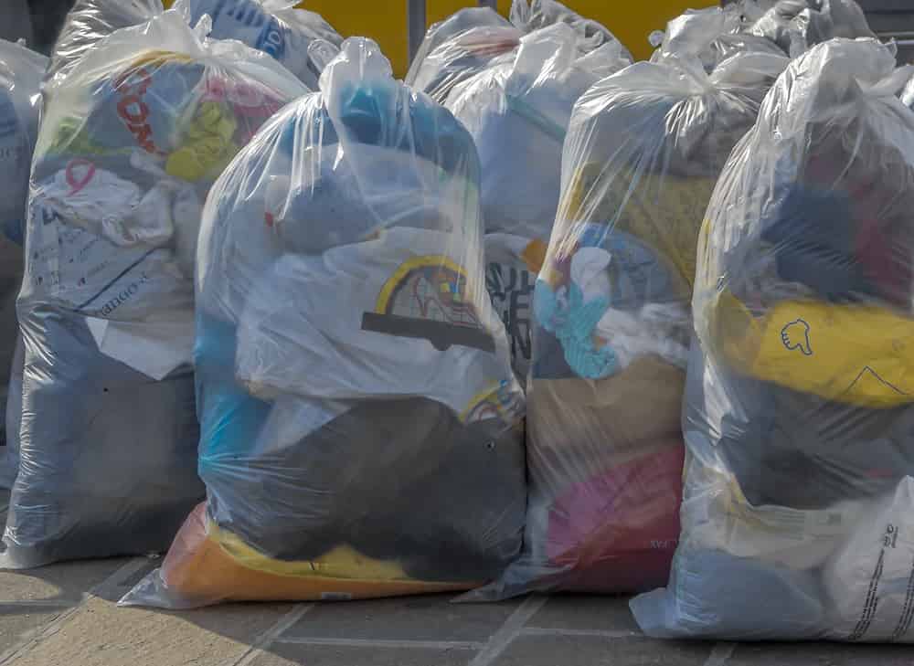 bags of used clothin TmjGM How to Pack for Your First Move
