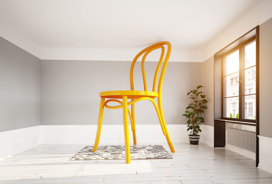 giant floor to ceiling chair in the middle of the room