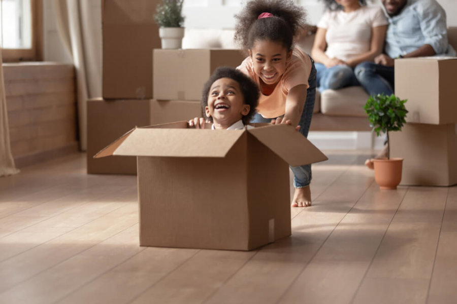 kids playing in moving boxes