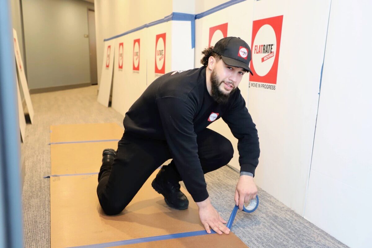 Flatrate mover doing floor protection