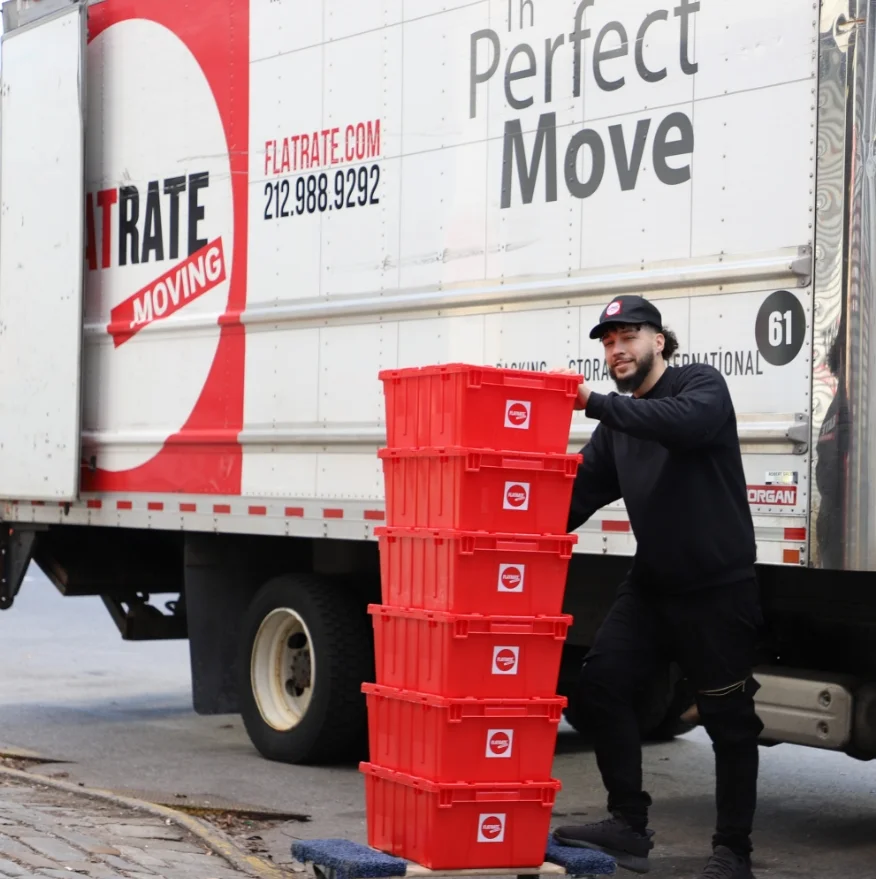 Flatrate mover moving red boxes