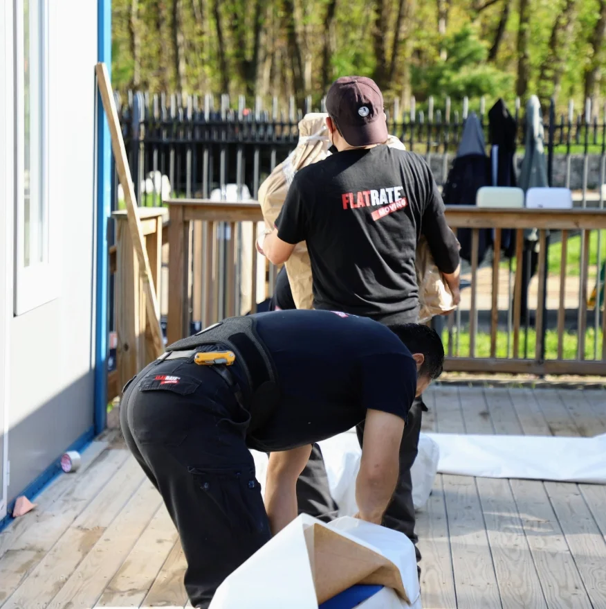 Man packing a furniture outside