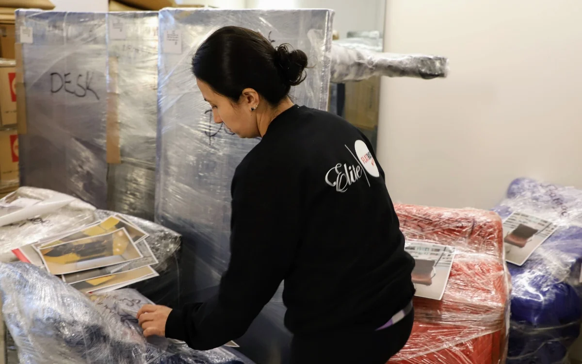 Lady wrapping furnitures