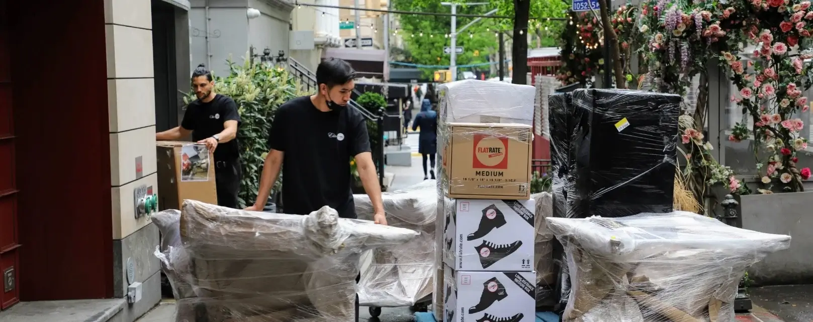 Movers moving furnitures on the street