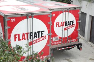 FlatRate Moving Trucks 300x200 Tips For A Successful Corporate Relocation