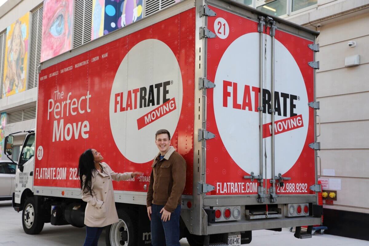 Flatrate clients next to a moving truck