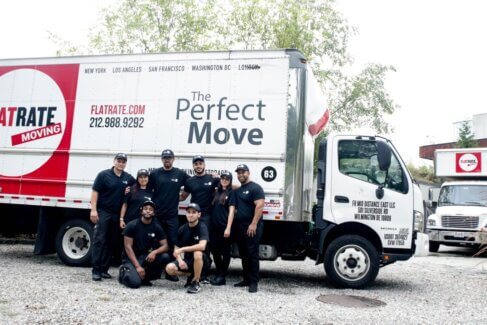 FlatRate Movers in front of FlatRate Moving truck