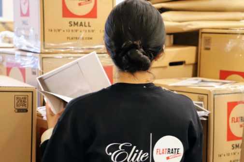 Lady organizing the moving boxes