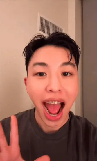 close-up of a young man talking to the camera