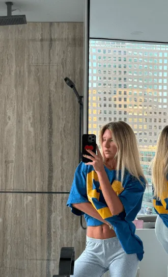 lady posing in front a mirror